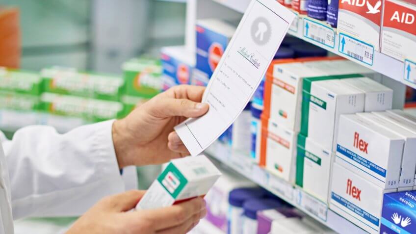 pharmacist filling a prescription