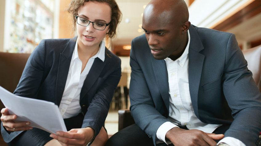 man and woman discussing 401k options