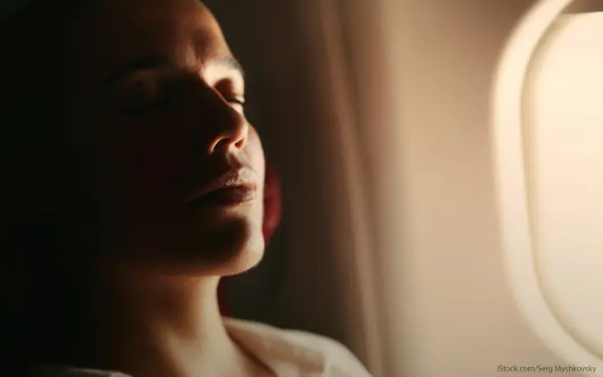 woman relaxing on an airplane