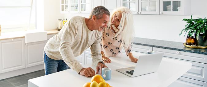 An older couple discusses how best to maximize 401(k) contribution limits.