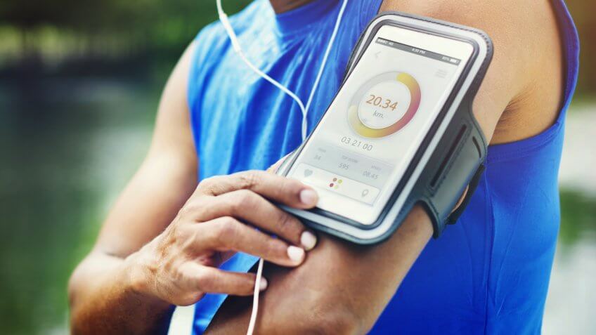 man-running-tracker-armband-fitness-app-tracker