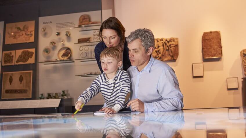 family with young boy at the museum