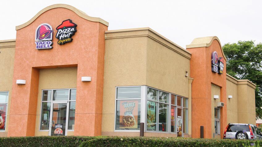 Downey, California, USA - May 9, 2016: Taco Bell and Pizza Hut are American chain of fast food restaurants and subsidiary of Yum! Brands, Inc.
