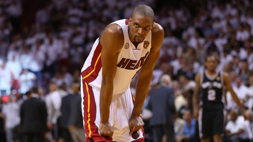 MIAMI, FL - JUNE 18: Chris Bosh #1 of the Miami Heat reacts late in the fourth quarter while taking on the San Antonio Spurs during Game Six of the 2013 NBA Finals at AmericanAirlines Arena on June 18, 2013 in Miami, Florida.