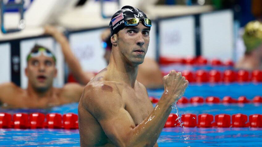 RIO DE JANEIRO, BRAZIL - AUGUST 09: Michael Phelps of the United States celebrates winning gold in the Men's 200m Butterfly Final on Day 4 of the Rio 2016 Olympic Games at the Olympic Aquatics Stadium on August 9, 2016 in Rio de Janeiro, Brazil.