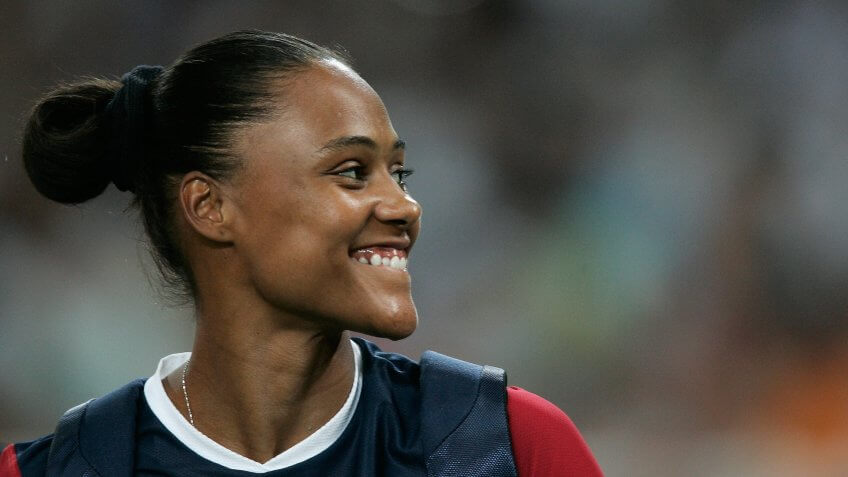 ATHENS - AUGUST 25: Marion Jones of USA is seen before the women's long jump qualifying round on August 25, 2004 during the Athens 2004 Summer Olympic Games at the Olympic Stadium in the Sports Complex in Athens, Greece.