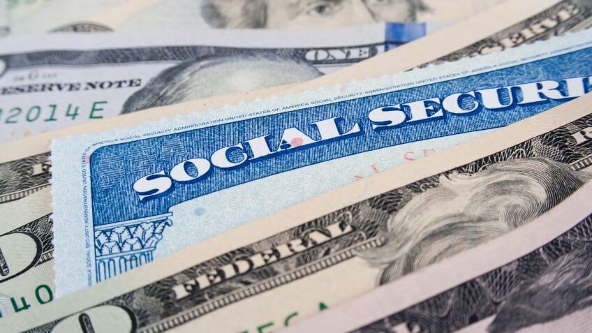 Protect and expand social security. social security card with cash