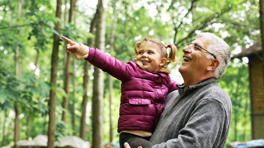 Granddaughter with cute little granddaughter enjoying in the woods.
