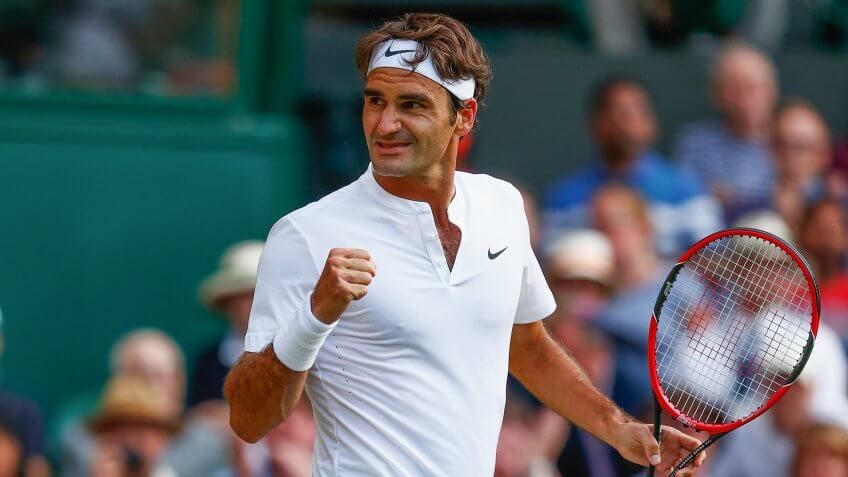 LONDON, ENGLAND - JULY 06: Roger Federer of Switzerland celebrates match point in his Gentlemen's Singles Fourth Round match against Roberto Bautista Agut of Spain during day seven of the Wimbledon Lawn Tennis Championships at the All England Lawn Tennis and Croquet Club on July 6, 2015 in London, England.