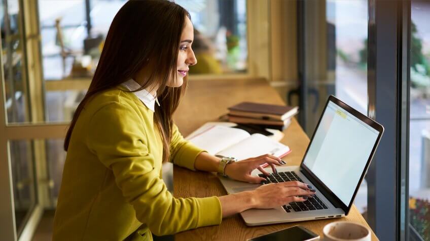 11902, Horizontal, woman on computer