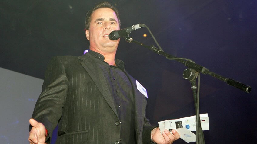 LAS VEGAS - OCTOBER 15: Tom Petters, founder and chairman of Petters Group Worldwide, speaks at the launch of the "uBid for Hurricane Relief" charity auction and benefit at the Empire Ballroom October 15, 2005 in Las Vegas, Nevada.