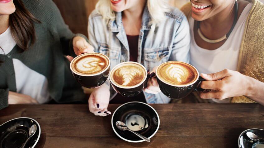 Women Friends Enjoyment Coffee Times Concept.