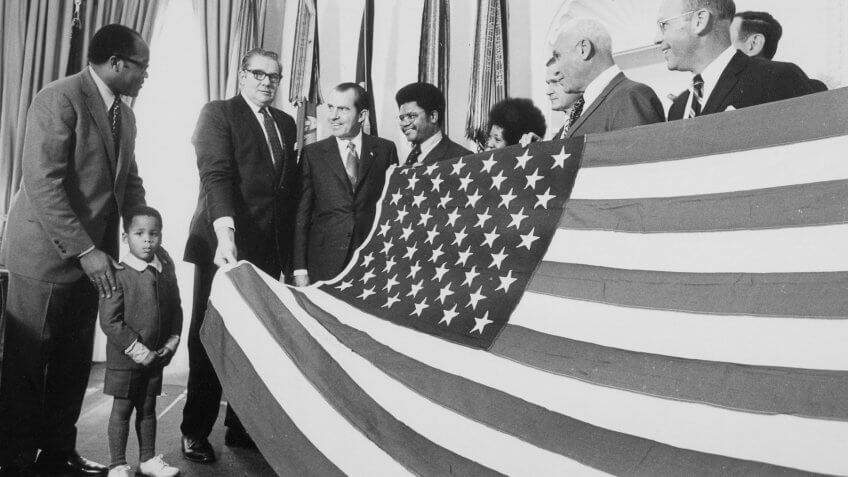 Richard Nixon presents American Flag