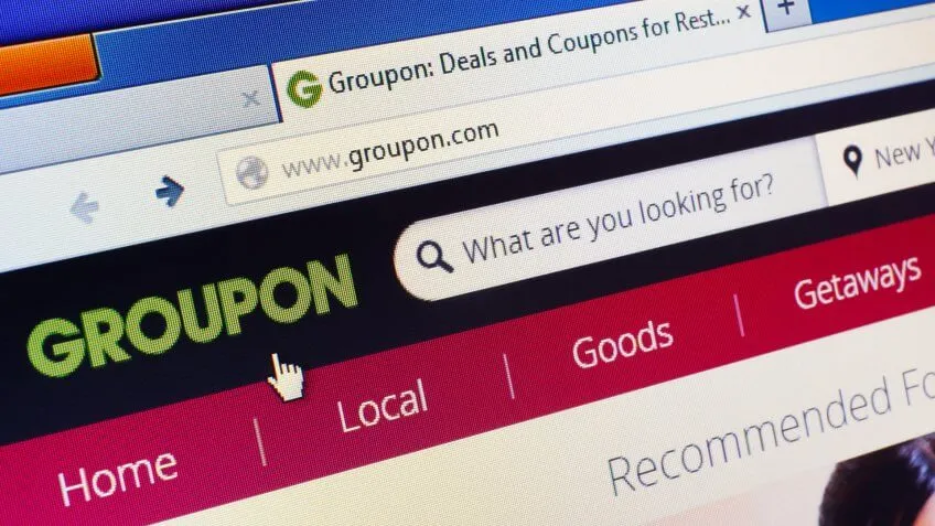 close up of groupon website open on a computer screen