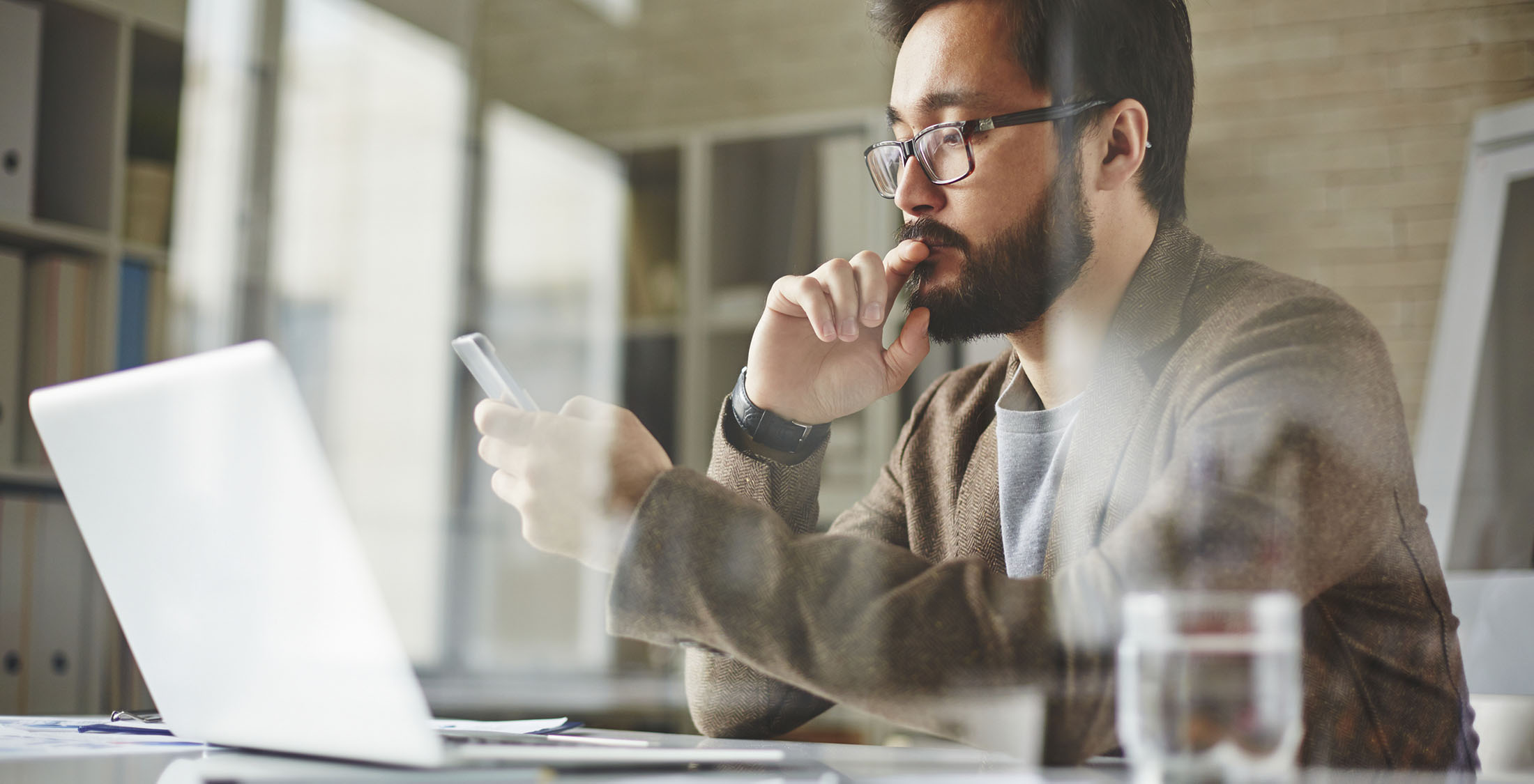 Apply to increase your lowest credit limit Modern office worker writing sms text message