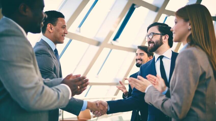 12087, 7 Habits of Success That Took Me to 7 Figures in My Bank Account, Horizontal, people, two corporate men shaking hands