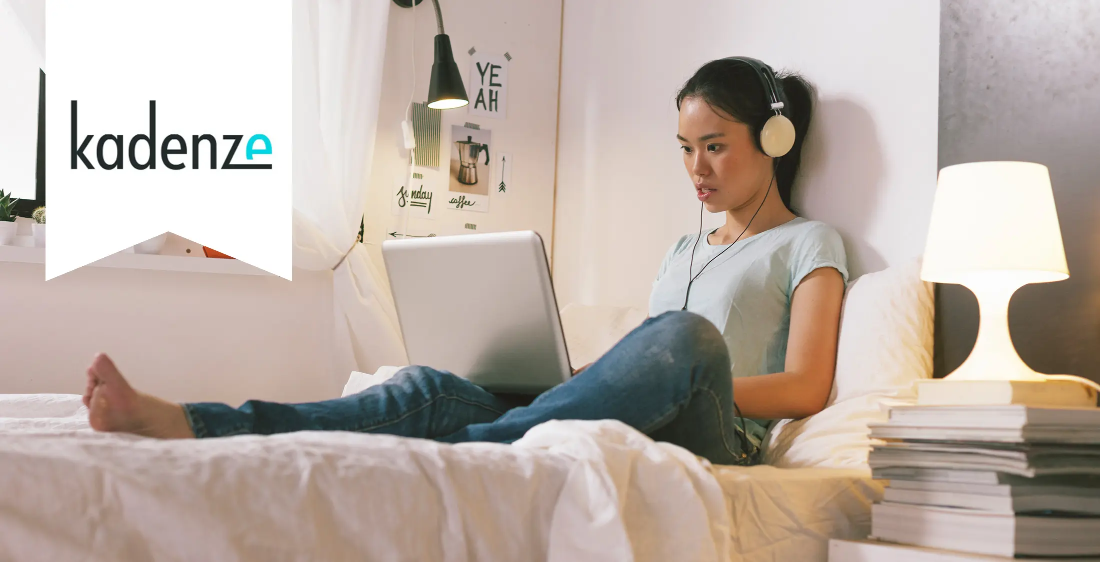 girl bed laptop headphones study