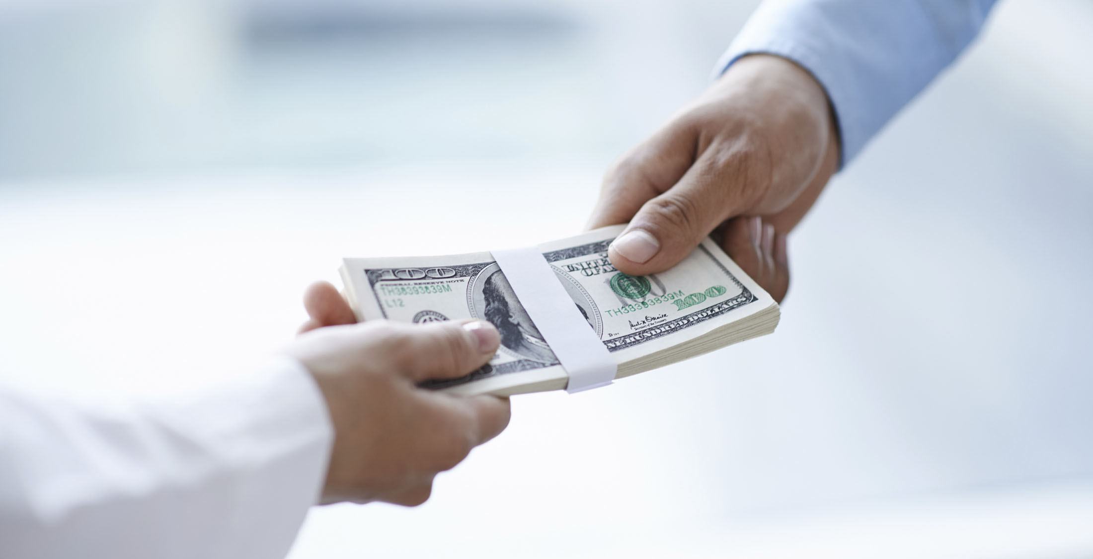 Funding a business. people handing over cash