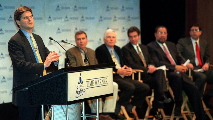 Mandatory Credit: Photo by STUART RAMSON/AP/REX/Shutterstock (6011297b)KELLY Steve Case, America Online's chairman and chief executive, left, addresses the news conference, in New York.
