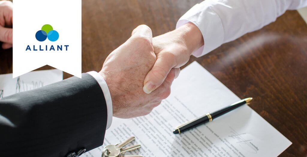 Alliant Credit Union. alliant handshake over document