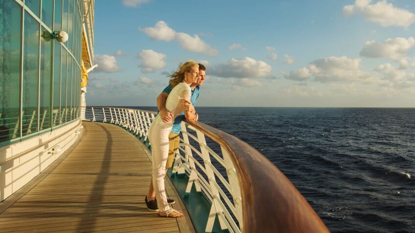 The Best Time Of Year To Go On A Cruise Gobankingrates - caucasian couple admiring view from boat !   deck