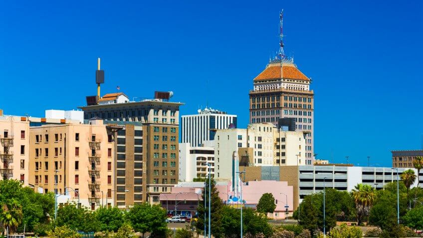 Fresno downtown skyline view with a clear blue sky in the background.