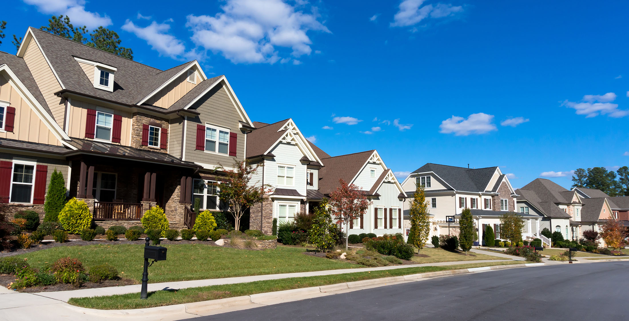 High mortgage rates. row of suburban houses