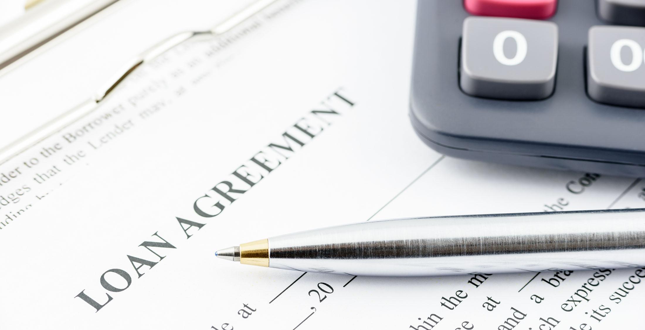 pen on loan agreement form