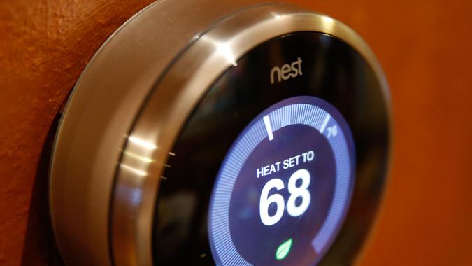 PROVO, UT - JANUARY 16: In this photo illustration, a Nest thermostat installed in a home is seen on January 16, 2014 in Provo, Utah.