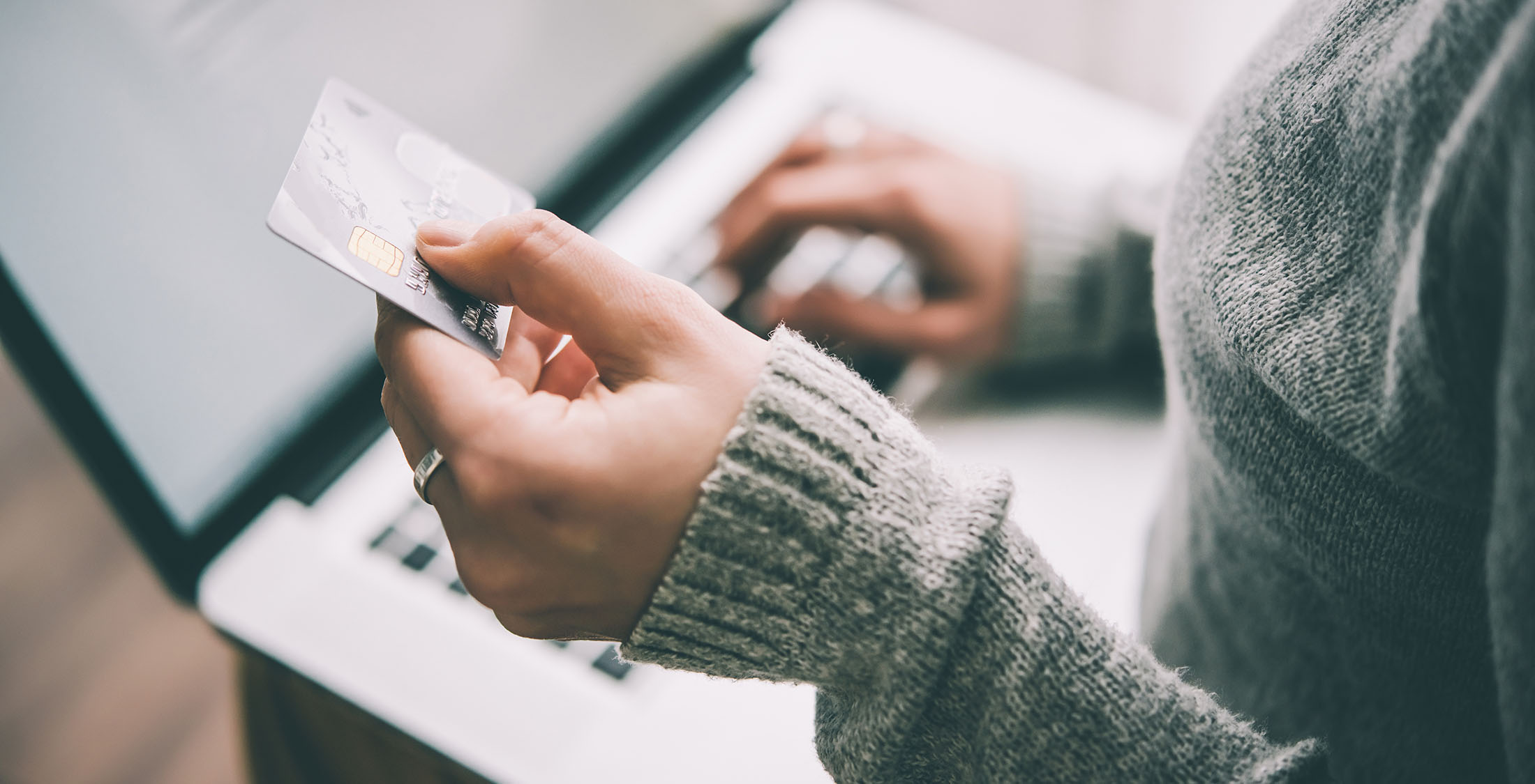 Open a line of credit. woman holding credit card