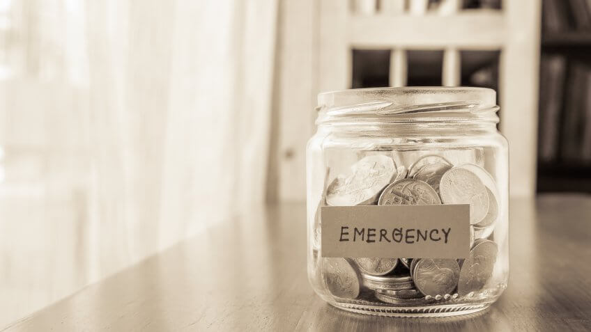 Build an emergency fund. emergency savings jar