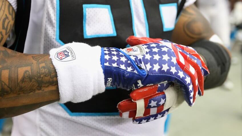 GLENDALE, AZ - SEPTEMBER 11: Detail of American flag themed gloves worn by wide receiver Steve Smith #89 of the Carolina Panthers during the NFL season opening game against the Arizona Cardinals at the University of Phoenix Stadium on September 11, 2011 in Glendale, Arizona.