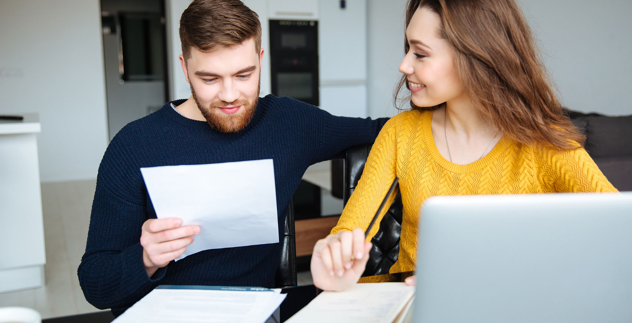 Expenses Split Down the Middle. couple going over finances