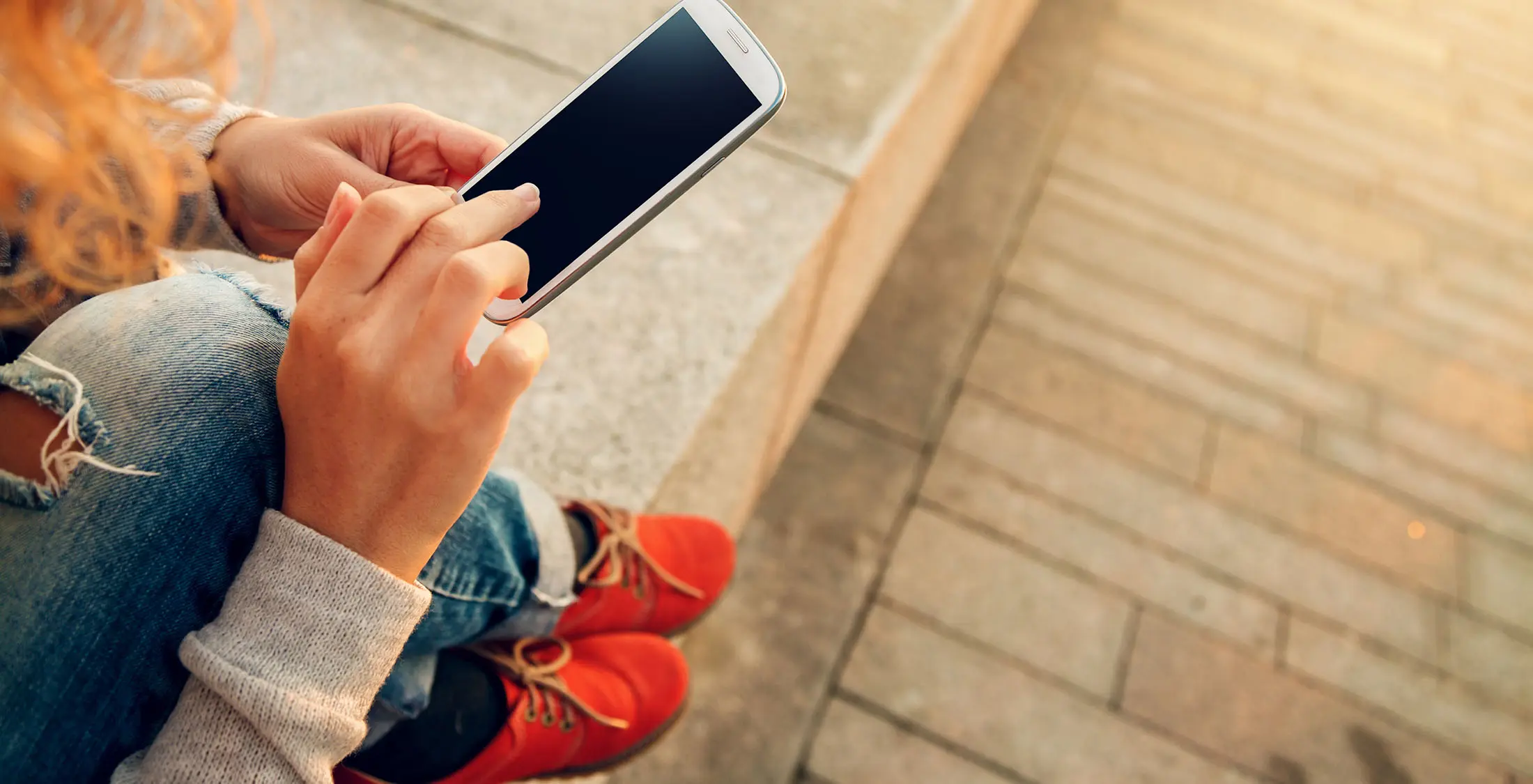 person using their cell phone