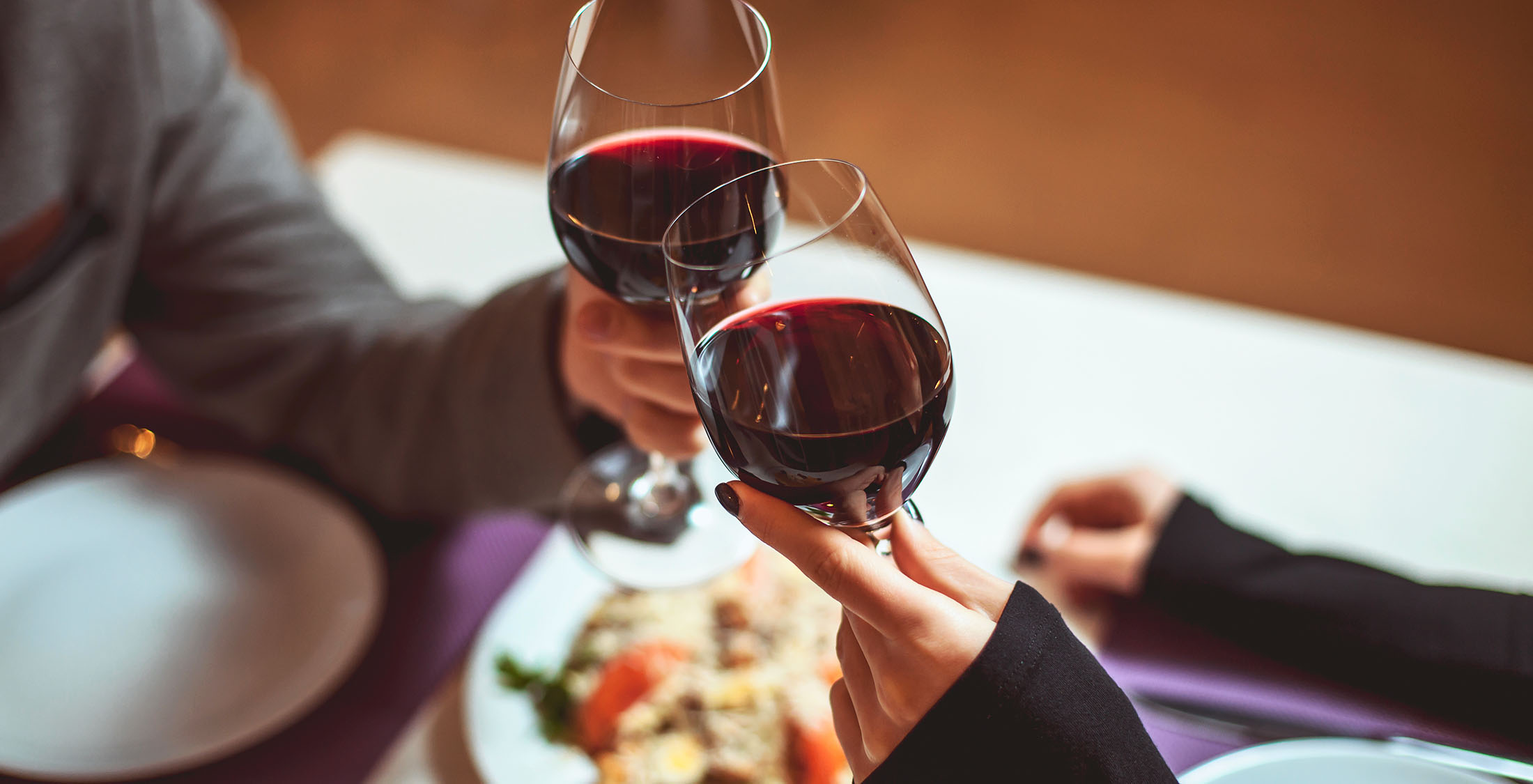 There aren't as many temptations. two people toasting wine glasses