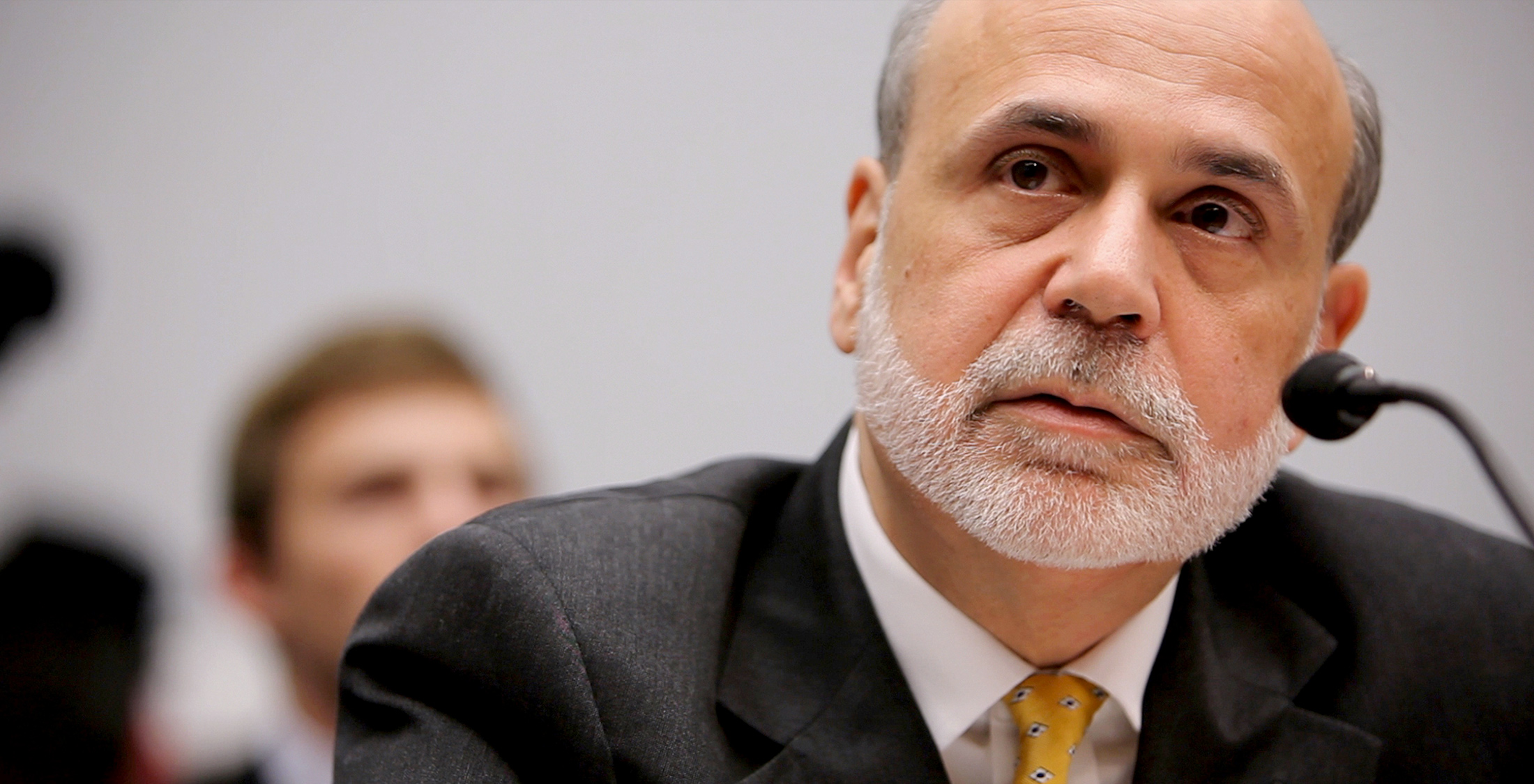 Money for Nothing: Inside the Federal Reserve ben bernake speaking into microphone
