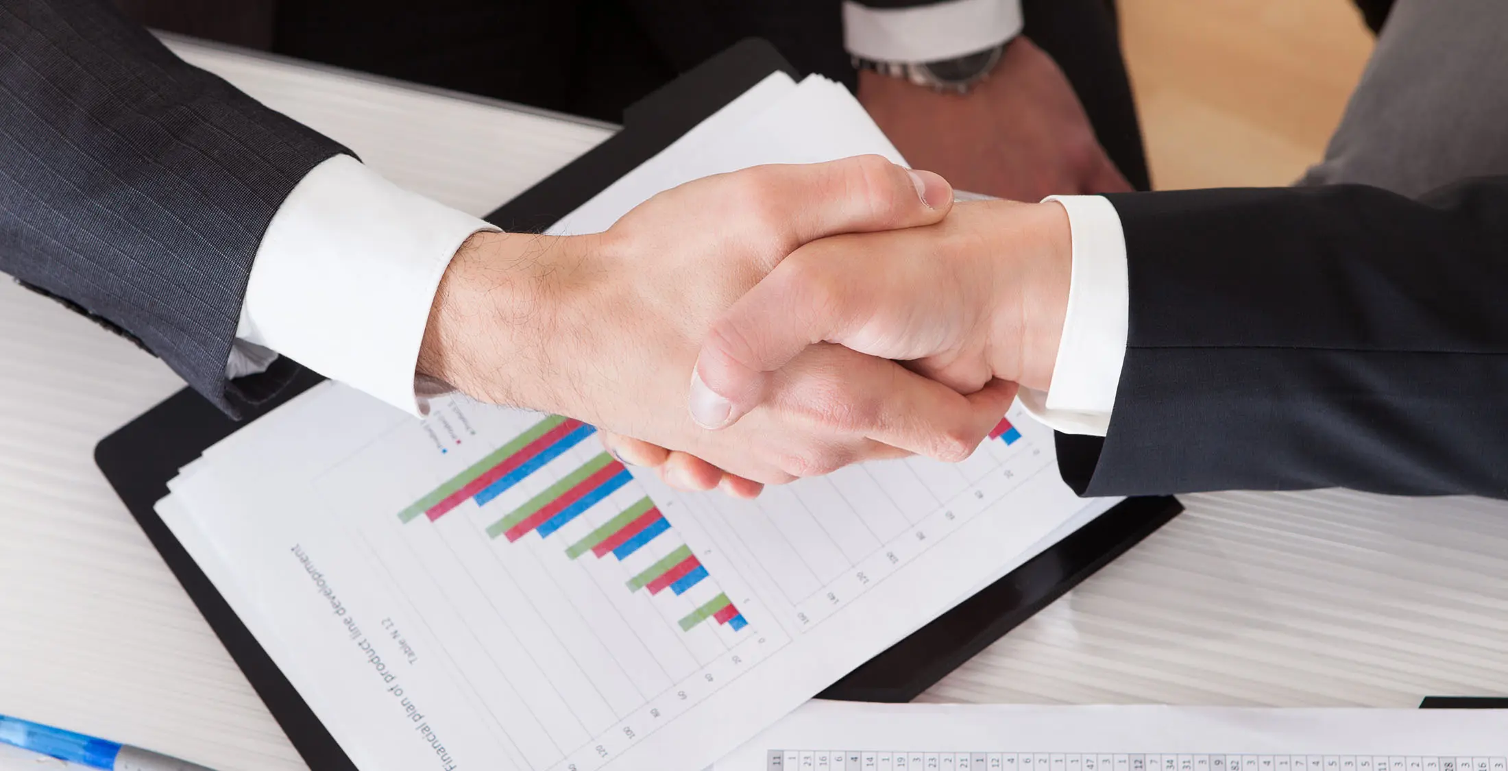 two people shaking hands