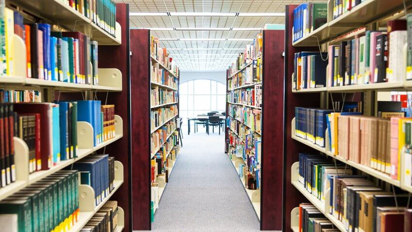 Check out your library's comic book selection. row of library shelves