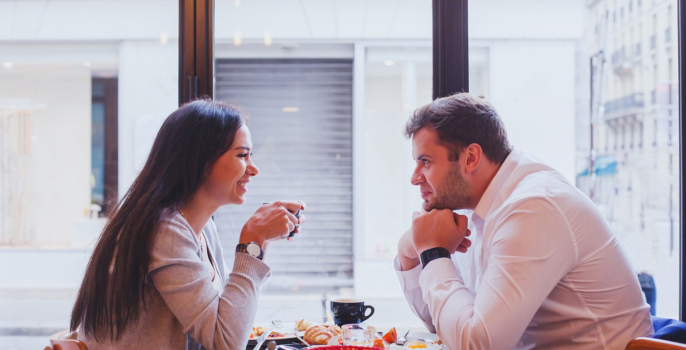 Good credit scores attract better partners. couple on romantic breakfast date