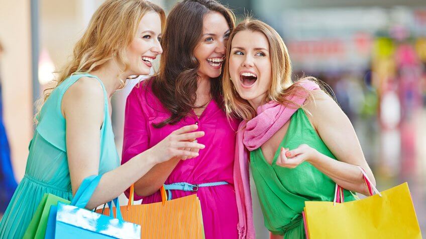 You keep comparing yourself to others. woman laughing and shopping