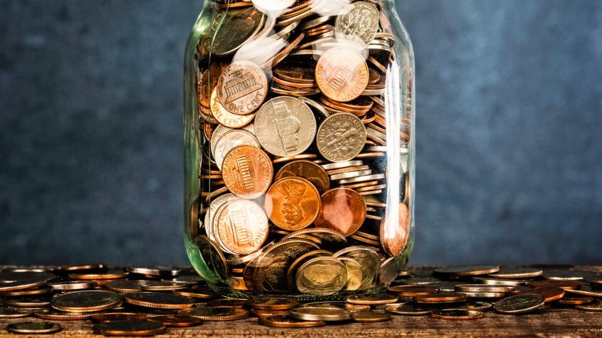 filled change coin jar