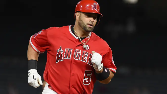 ANAHEIM, CA - AUGUST 22:  Albert Pujols #5 of the Los Angeles Angels of Anaheim runs the bases after hitting a three-run home run in the seventh inning against the Texas Rangers at Angel Stadium of Anaheim on August 22, 2017 in Anaheim, California.