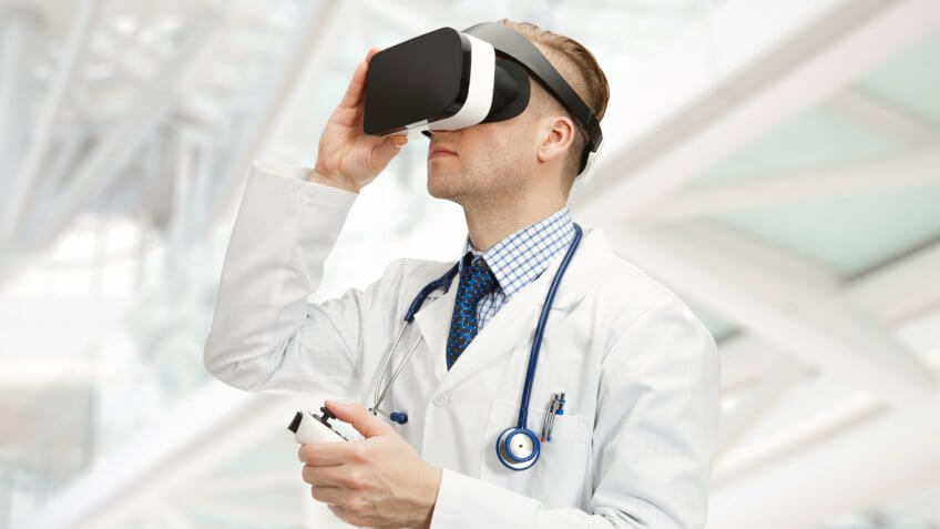 Man in lab coat wearing WorldViz headset