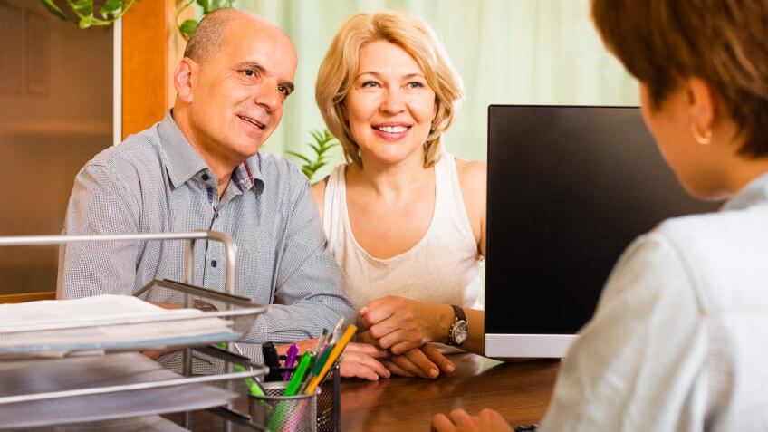 Couple talking to an advisor Couple talking to an advisor