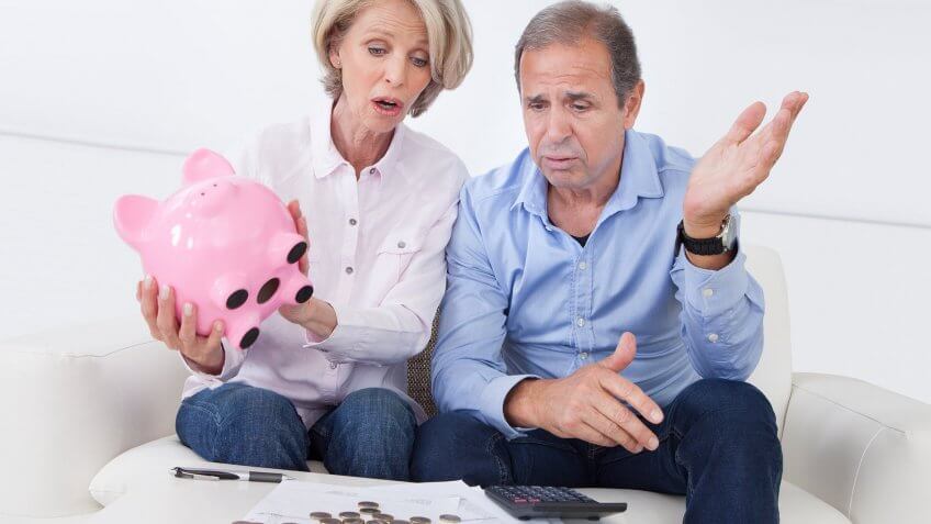 Every young person should save for retirement and avoid cashing out their 401k. older coupe emptying piggy bank