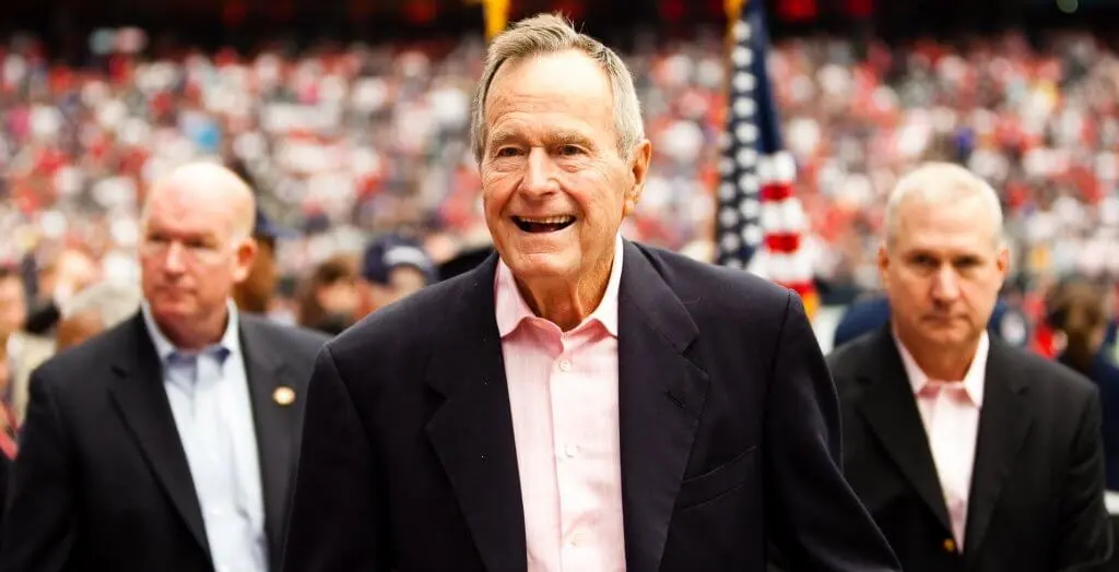 george h.w. bush at a football game