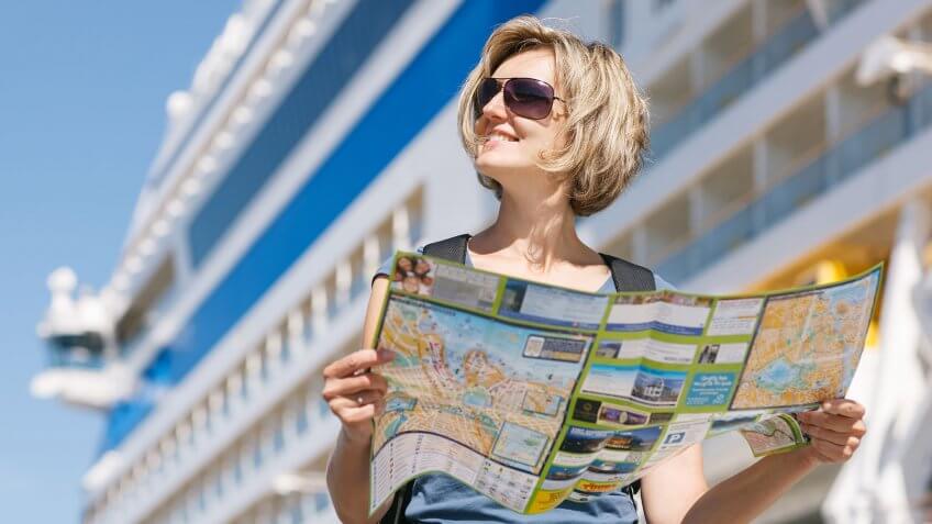 Consider a repositioning cruise. woman with map