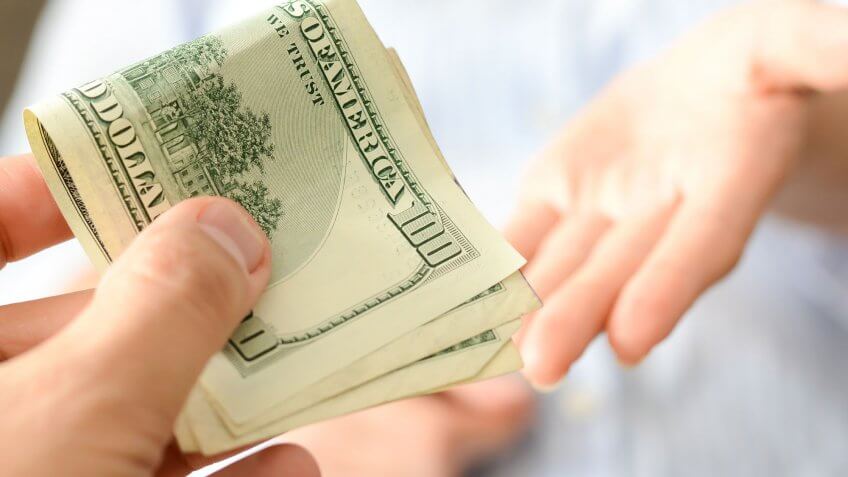 Offer to pay your rent up front. hands transferring $100 bills
