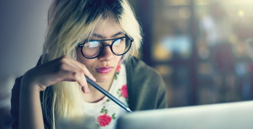 It is easier to switch banks. woman on computer late night
