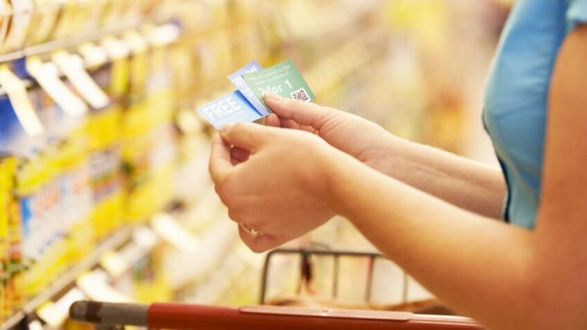 Use coupons in a grocery store Use coupons in a grocery store